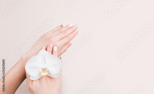 Manicure and flower composition.