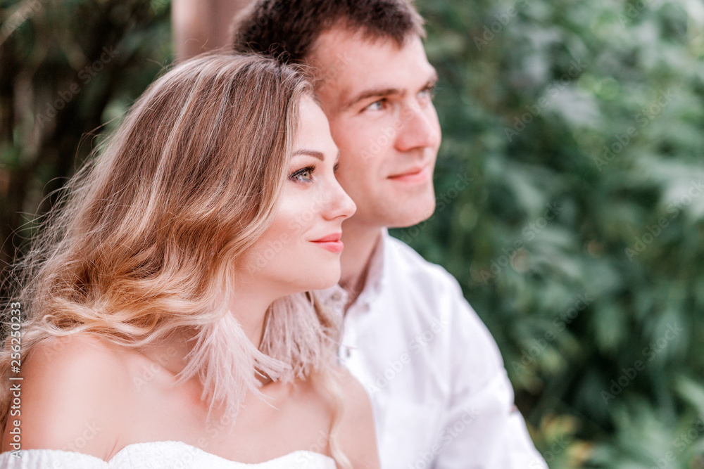 Bride and groom are looking somewhere. Horizontal photo Bride and groom are looking somewhere. Horizontal photo