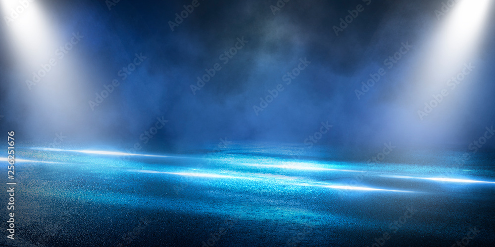 Background of the room with concrete pavement. Blue and pink neon light. Smoke, fog, wet asphalt with reflection of lights. Abstract light, searchlight rays. Night view of the street with lights, dark