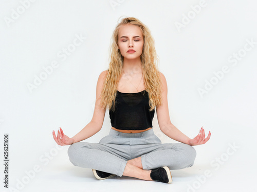 Beauty Woman Portrait. model Girl sitting on the floor freelancer with Perfect Clean Skin.