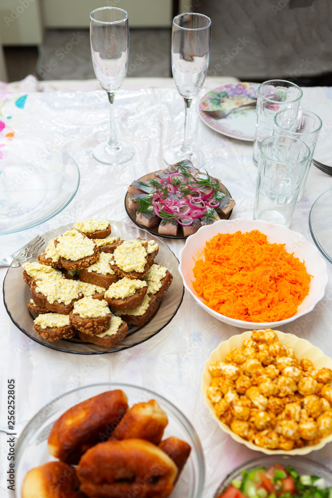 homemade food. toasts with cheese, salads, pies