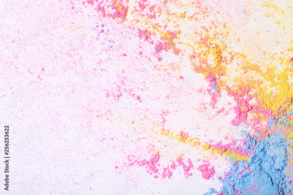 Colorful holi powders on white background