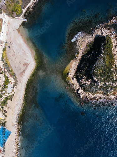 Fotografía Aerial drone view video of sea near beach with birds fly, Attica, Greece