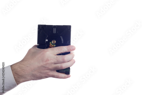 Hand holding hard drive isolated on white background