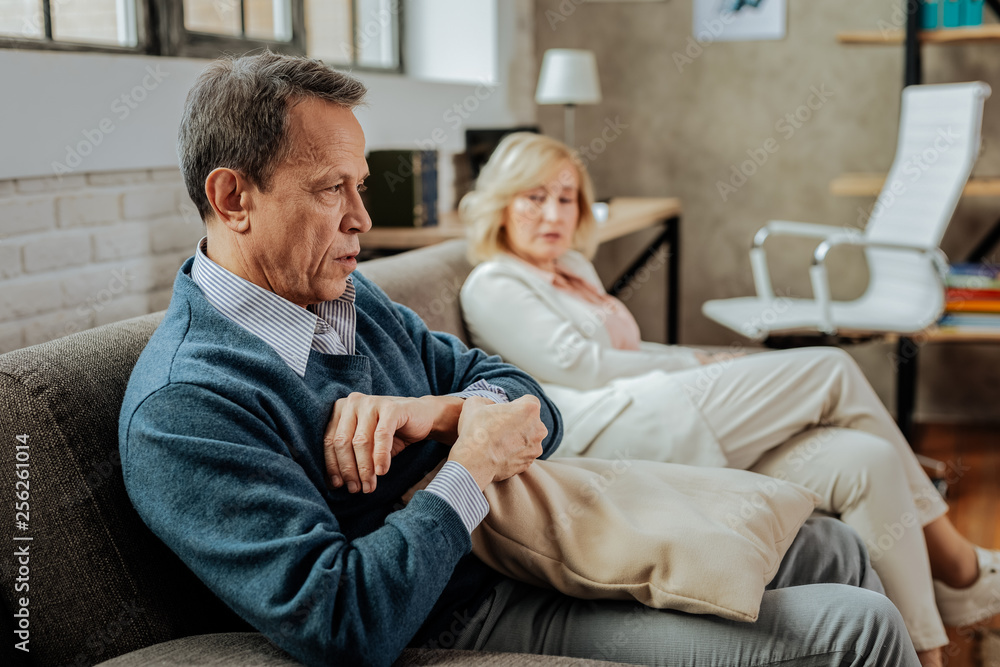 Old man being nervous while discussing problems in relationships Old man being nervous while discussing problems in relationships