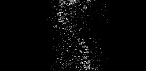Blurry images of soda liquid water bubbles or carbonate drink or oil shape or beer fizzing or splashing and floating drop in black background for represent sparkling and refreshing