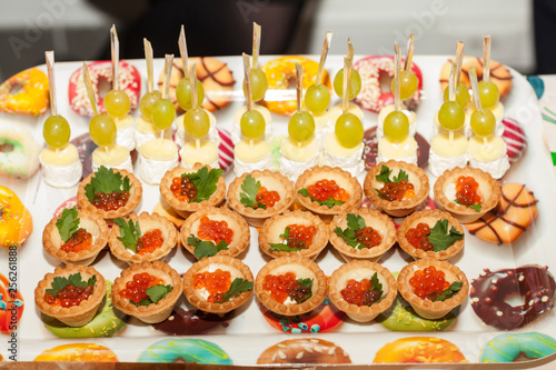 canapes with salmon and caviar © oleg_ru