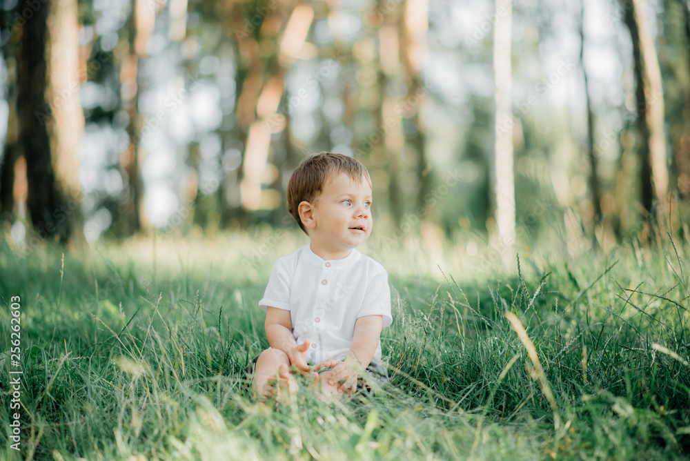 Happy young family spending time together outside in green nature Happy young family spending time together outside in green nature