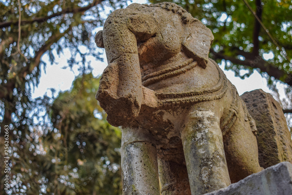 epic ruined ancient stone carving of a elephant