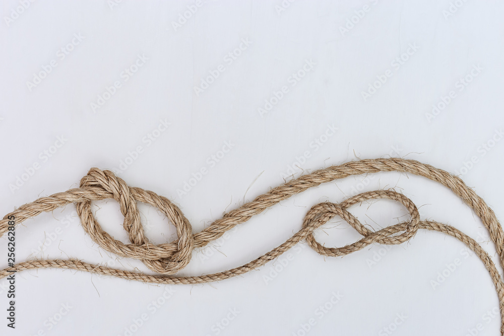 Figure-eight knot or Savoy knot on white background. Copy space. Figure-eight knot or Savoy knot on white background. Copy space.