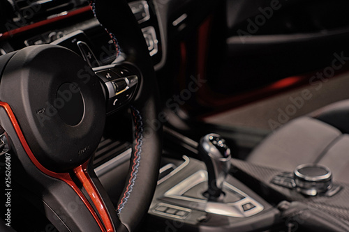 sportcar interior with red accents © MarcoAlla