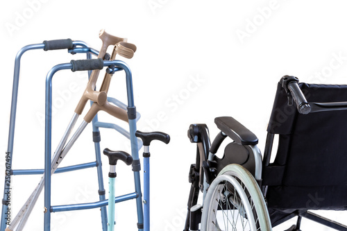 Valokuva set of mobility aids including a wheelchair, walker, crutches, quad cane, and crutches