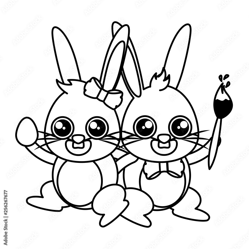 beautiful rabbits couple with egg and paintbrush