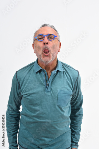 man yawning on white background © curto