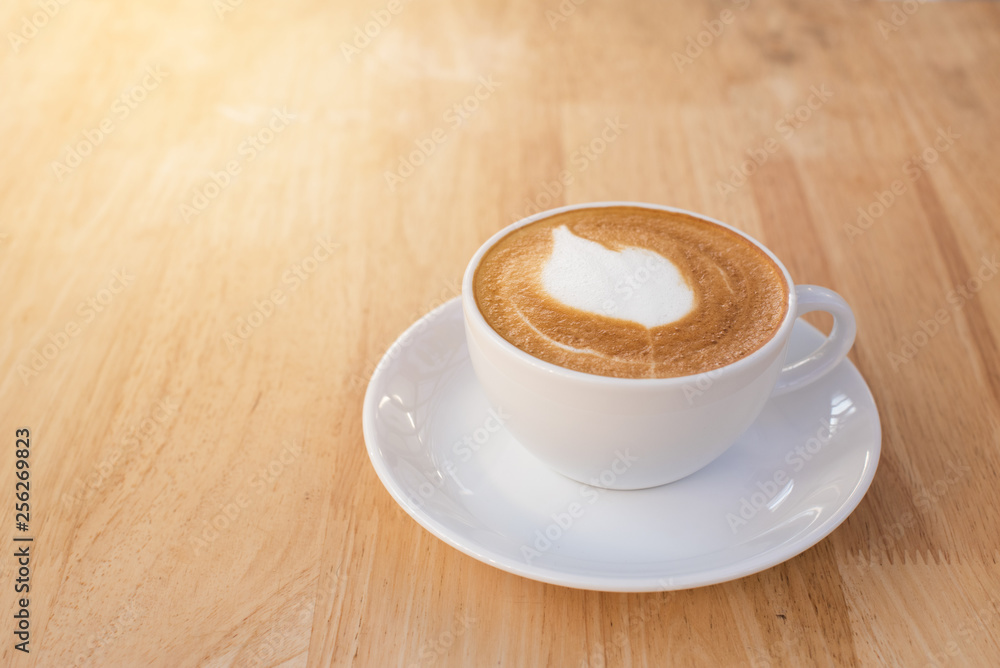 Fototapeta premium Cup of latte coffee on the table