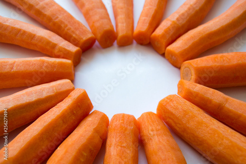 Carrots in the form of rays with space for text.
