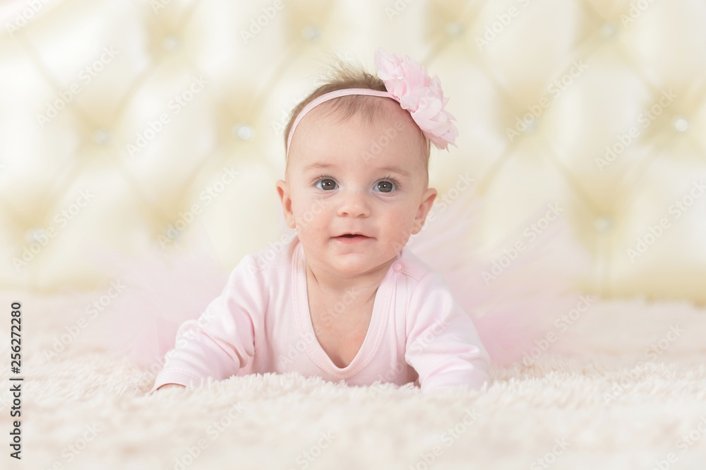 Portrait of cute charming girl in pink dress Portrait of cute charming girl in pink dress