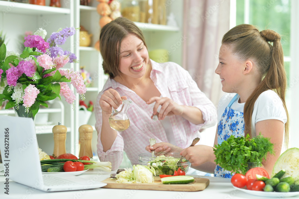 Portrait of funny girls preparing fresh salad Portrait of funny girls preparing fresh salad