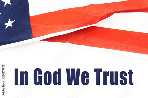 In God We Trust Text with flag over white background