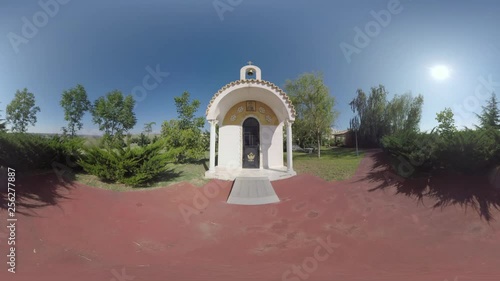 360 VR Video. Green garden with small chapel on the territory of summer resort. Nea Kallikratia, Greece photo