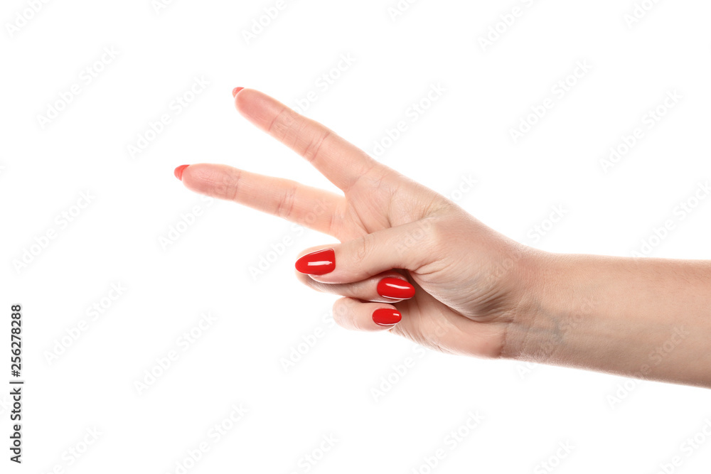 Hand showing the sign of victory and peace. Close up of female hand showing victory sign isolated on white background. Woman hand gesturing peace sign. Hand showing the sign of victory and peace. Close up of female hand showing victory sign isolated on white background. Woman hand gesturing peace sign.