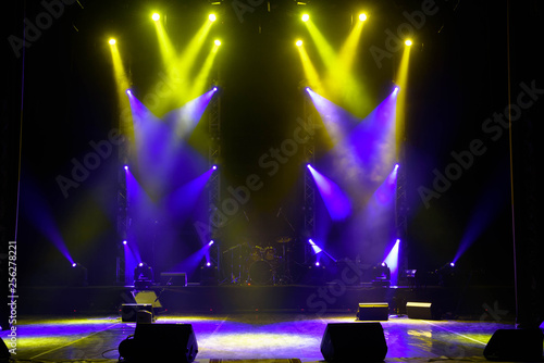 Empty stage. Multicolored lights, light show at the Concert.