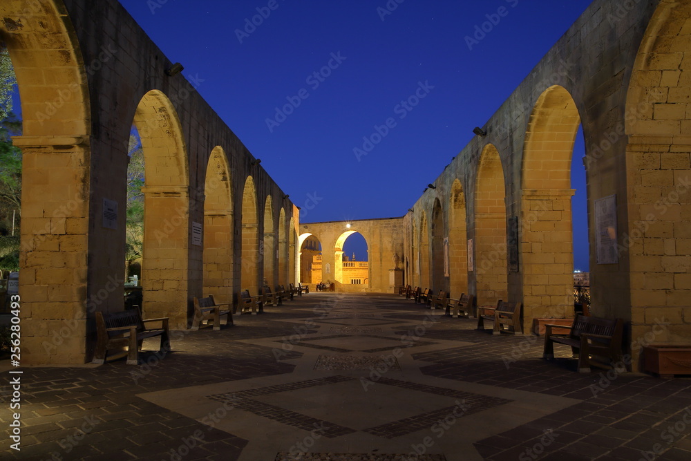 Architecture of Upper Barrakka Gardens in Valetta, Malta, night skyline