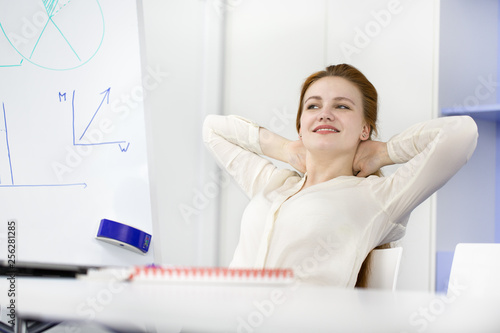 Businesswoman working at her office