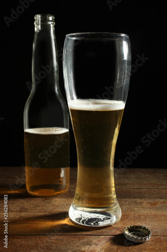 Bottle and glass with light beer