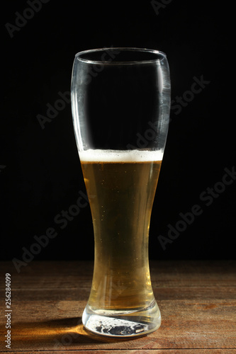 Light beer in a glass goblet