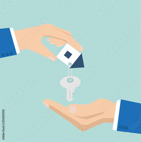 Vector of a house key with small house key ring given from one hand to another