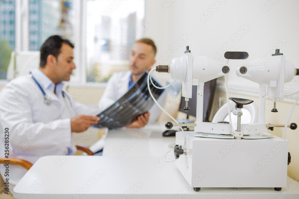 Two doctors working at the clinic Two doctors working at the clinic