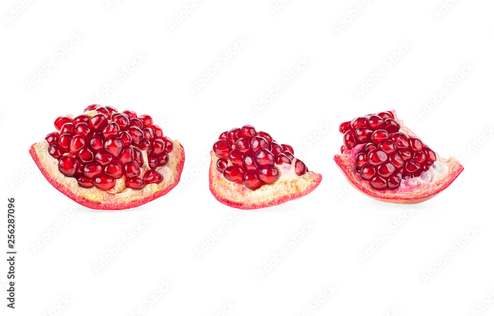 Pomegranate pieces with juicy grains isolated on white background Pomegranate pieces with juicy grains isolated on white background