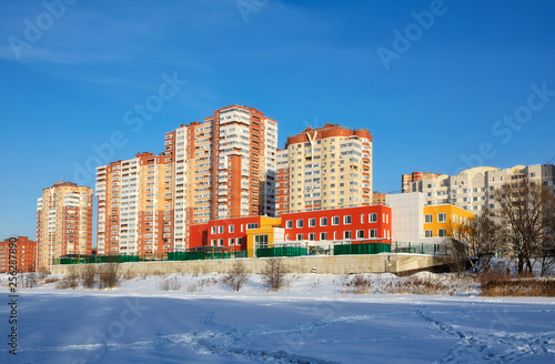 New residential neighborhood with kindergarten on a sunny winter day. City of Balashikha, Moscow region, Russia.