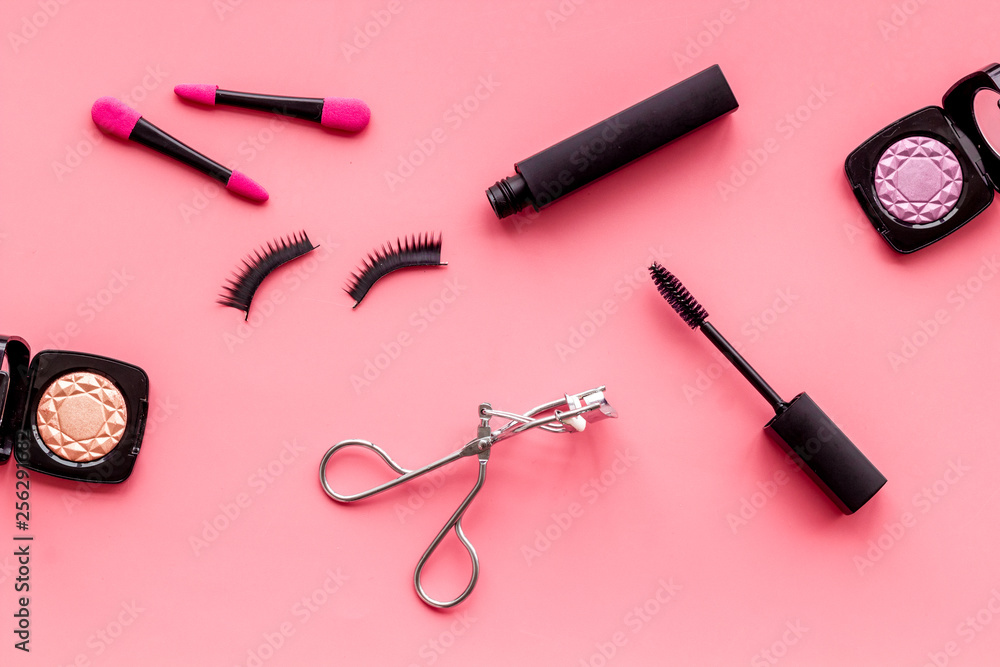 female desk with decorative cosmetic on pink background flatlay female desk with decorative cosmetic on pink background flatlay