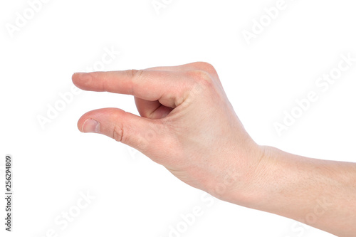 Male caucasian hand gesturing a small amount, or smal size, isolated on white background. photo