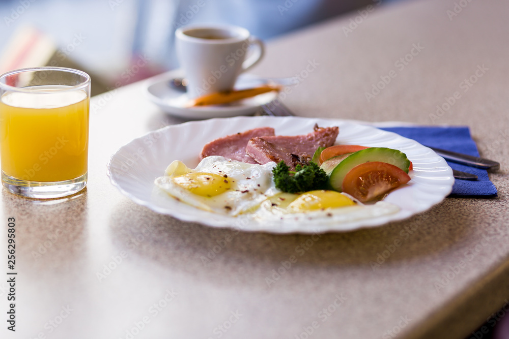 scrambled eggs with vegetables and sausage with coffee