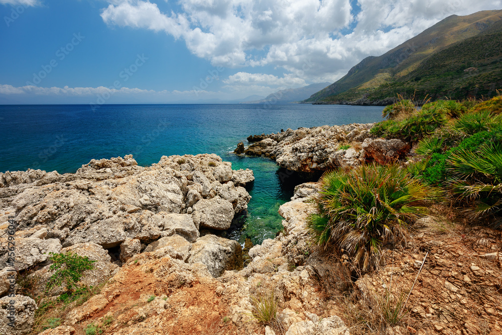 Seaside nature park with coastline cliffs, rare plants, museums, picnic areas & trails to the sea. Zingaro Nature Reserve in Sicily