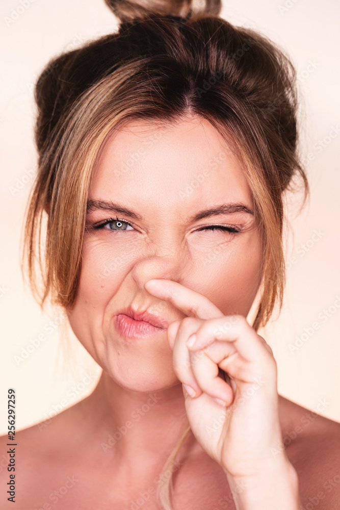 Funny woman with picking finger in her nose Funny woman with picking finger in her nose