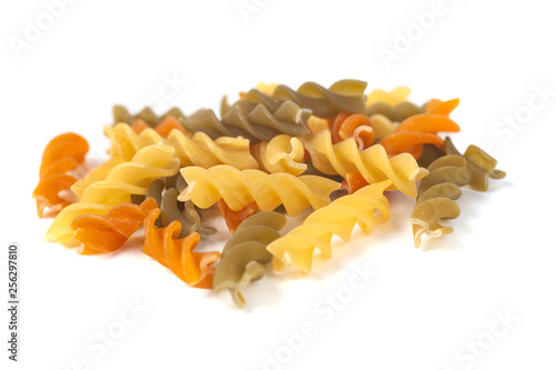 Colored italian pasta isolated on white background photo