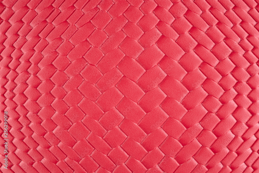 Fototapeta premium Background with red wicker material, close up – photo image