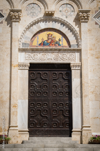 Wooden portal of an ancient Italian church.