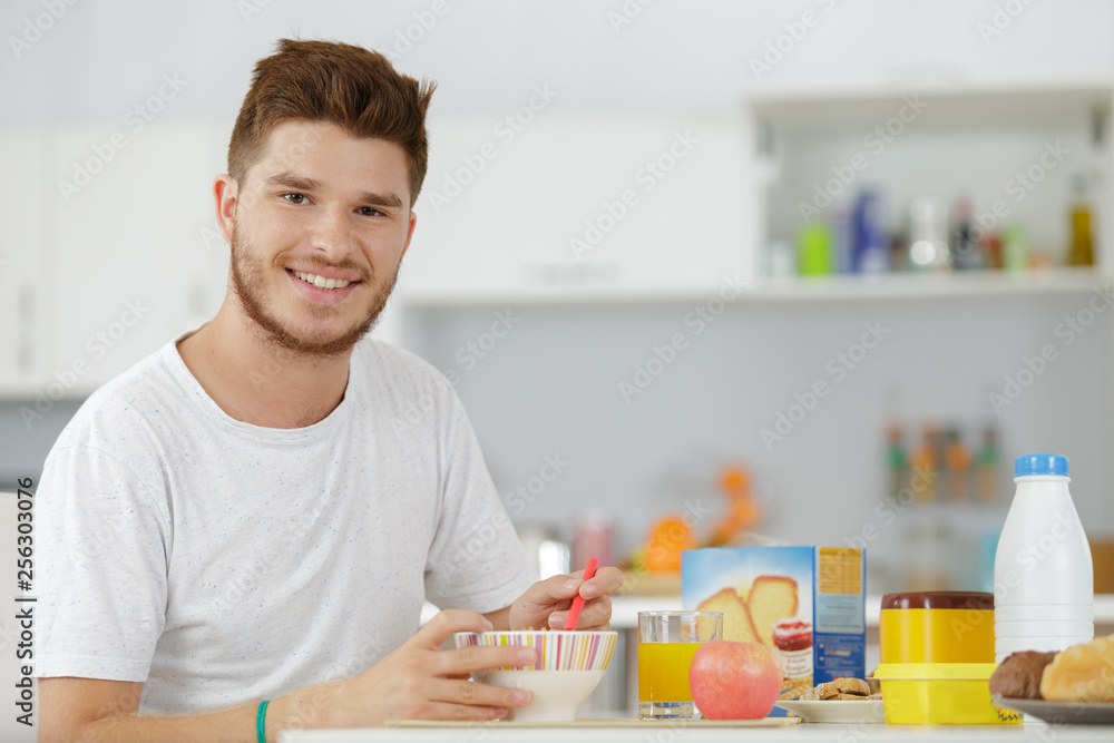 man at breakfast table looking sideways man at breakfast table looking sideways