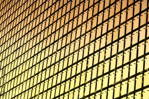 Wallpaper Mural Kinetic facade of the building. Metal plates in brushed stainless steel are suspended freely and swing in the wind Torontodigital.ca