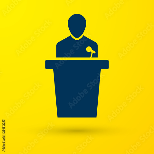 Blue Speaker icon isolated on yellow background. Orator speaking from tribune. Public speech. Person on podium. Vector Illustration