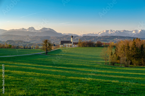 Germany, Bavaria, Upper Bavaria, Oberland, Mangfall Mountains, View of St Marinus and Anian pilgrimage church in the morning light photo