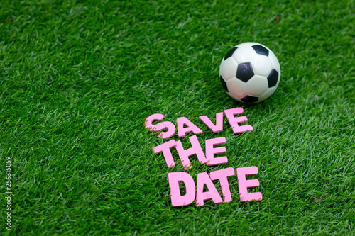 Football Soccer Save the Date on green grass