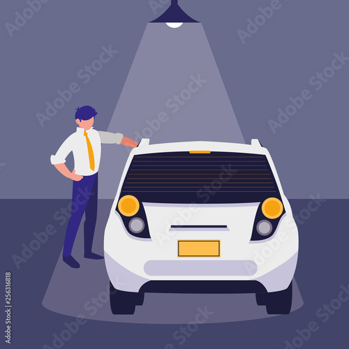 businessman with car in the workshop
