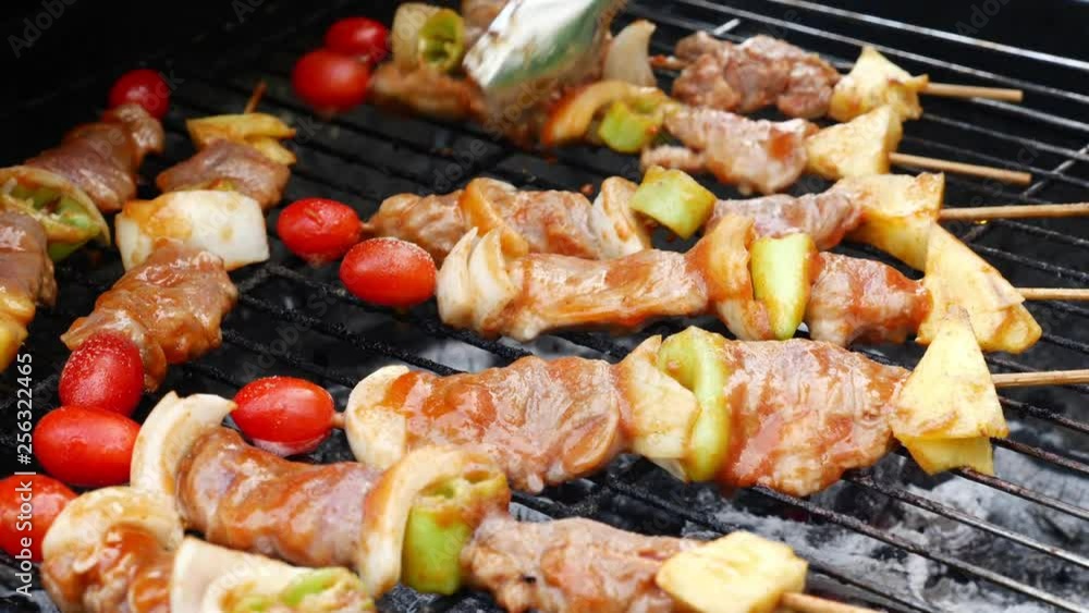 Grilled meat and vegetable skewers on charcoal stove Grilled meat and vegetable skewers on charcoal stove