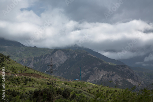 Mountains of the North Caucasus, mountain tops in clouds. Wild nature